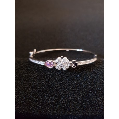 Sterling silver bangle with clover flowers and Zircon gemstones.